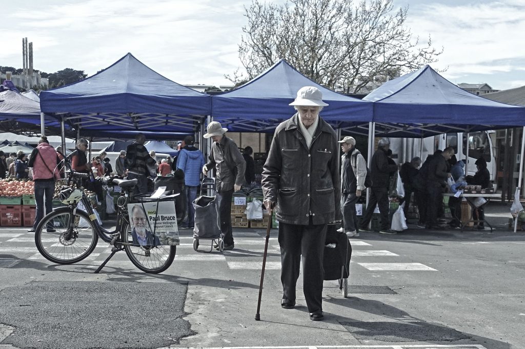 Two people at Newtown market in same outfit