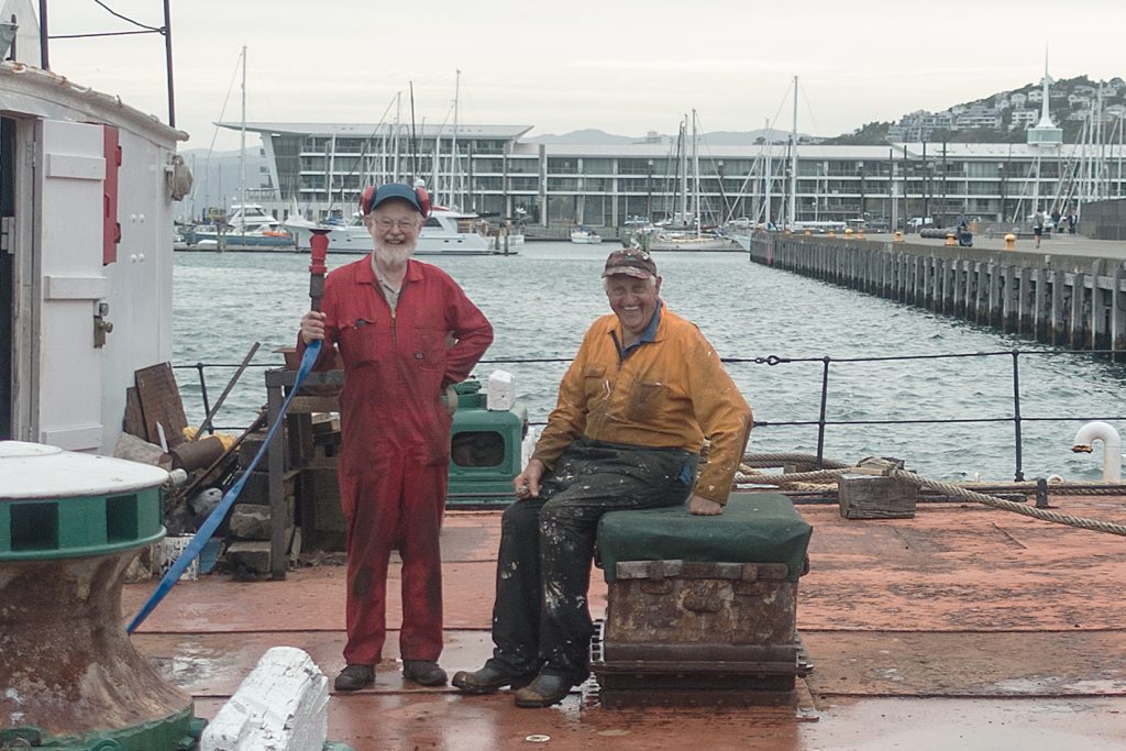 Two men on boat in Wellington Harbour